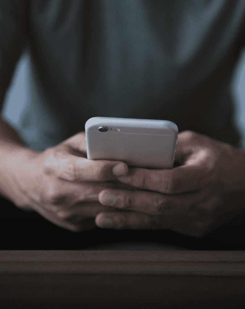 close up of person holding a smartphone